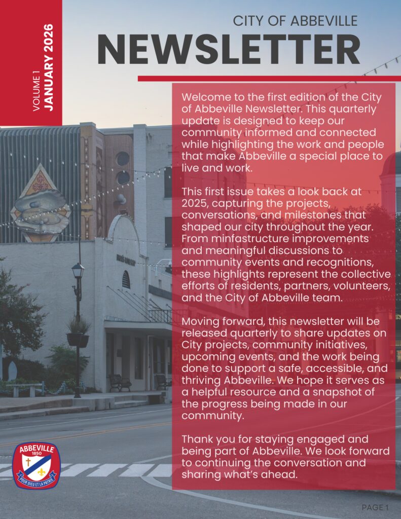 Cover page of the City of Abbeville Newsletter, Volume 1, January 2026. The design features a downtown Abbeville street scene with historic buildings and string lights. Large text reads “City of Abbeville Newsletter.” A red text panel explains that this first quarterly edition highlights work from 2025, including infrastructure improvements, community events, and collective efforts of residents, partners, volunteers, and city staff. The City of Abbeville seal appears in the lower left corner.