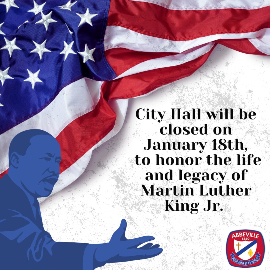 Holiday closure notice graphic for Martin Luther King Jr. Day. The design features a large American flag draped across the top portion of the image with a textured white background. A blue illustration of Dr. Martin Luther King Jr. appears in the lower left corner with an outstretched hand. The graphic text reads: "City Hall will be closed on January 18th, to honor the life and legacy of Martin Luther King Jr." The City of Abbeville logo is displayed in the lower right corner. The graphic announces the closure of City Hall in observance of Martin Luther King Jr. Day and honors Dr. King's contributions and legacy.