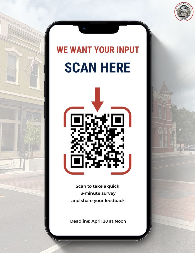 Graphic showing a smartphone with the message “We Want Your Input” and “Scan Here,” featuring a QR code that links to a short Downtown Abbeville community survey. Text notes the survey takes about 3 minutes and the deadline is April 28 at noon.